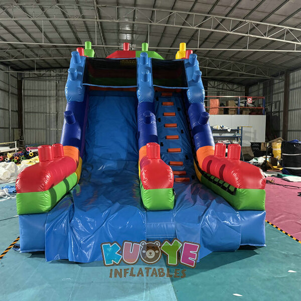 SL187 (2) https://kuoyeinflatables.com/product/sl187-building-block-inflatable-slide/