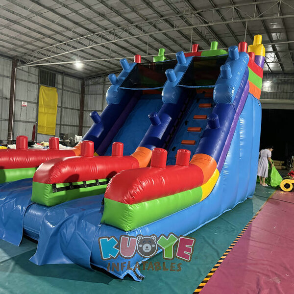 SL187 (3) https://kuoyeinflatables.com/product/sl187-building-block-inflatable-slide/